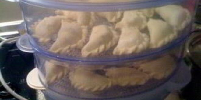 Рецепт вареников с творогом и изюмом