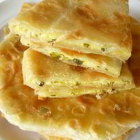 Плацинды с творогом и зеленью