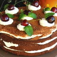 Рецепт Шоколадного торта с творожным кремом и вишней