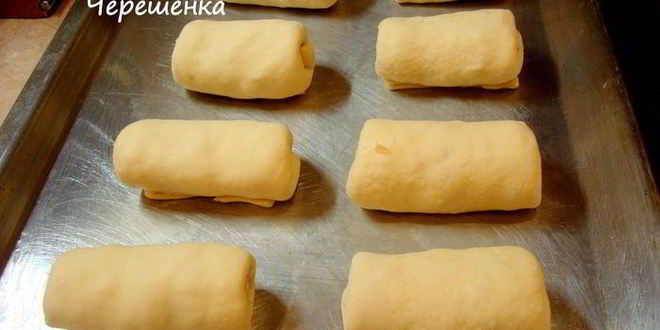 Рецепт закусочных слоеных рулетиков с рыбой, капустой и яйцом